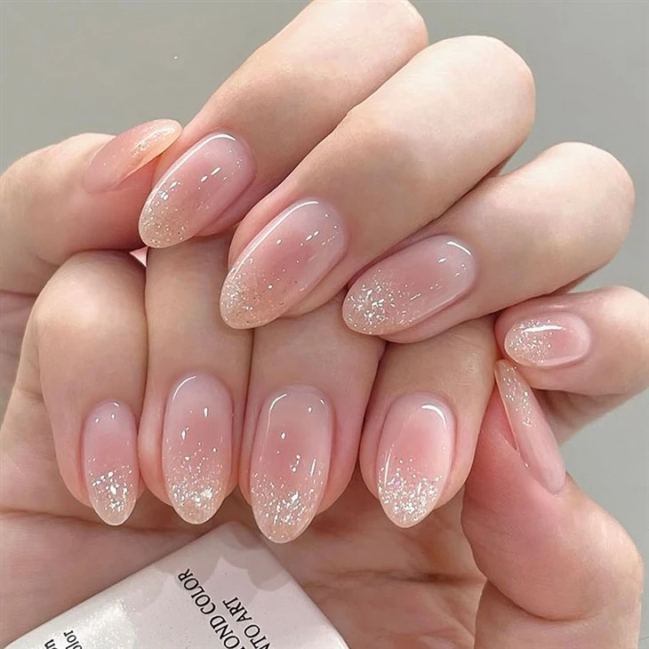 Roze glitter Ombre pers op nagels